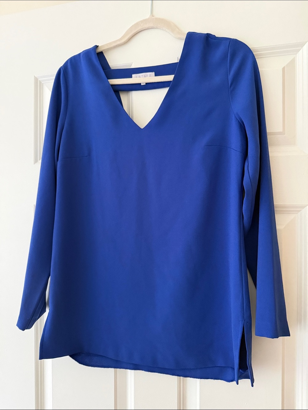 1. State Cobalt V-Neck Top with Open Back Detail